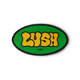 Retro Bubble Lush. An oval-shaped, green iron-on patch with the retro LUSH font, trimmed in black. 