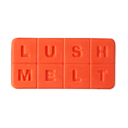 Peach Blossom. A bright orange/coral rectangle wax met sectioned into eight squares spelling Lush Melt.