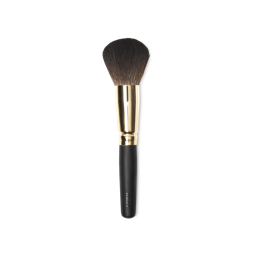 People Powder Brush. A large, dome-shaped powder brush, with tapered brown bristles and a gold and dark wooden handle.
