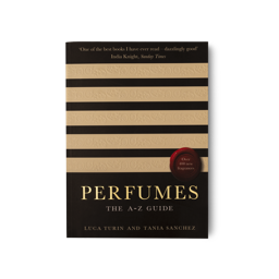 The book Perfumes, The A-Z Guide presented with black and cream embossed stipes.