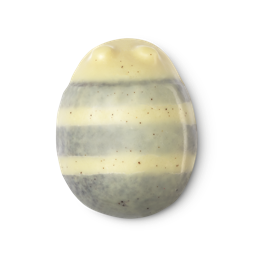 Scrubee. A cream & brown striped, bee shaped, body butter, flecked with ground coconut shell and ground almonds.