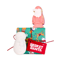 Secret Santa. A square, gift box wrapped with green paper illustrated with reindeer, snowmen and Christmas decals, tied with red string. There is a Santa-shaped bath bomb sitting on top of the box and a snowman-shaped bath bomb sitting beside it.