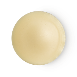An arial view of rich cream coloured, balm-like Shade solid perfume.