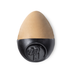 Slap Stick 20N. A medium light-neutral, tan coloured, egg-shaped solid foundation, with a black wax base.