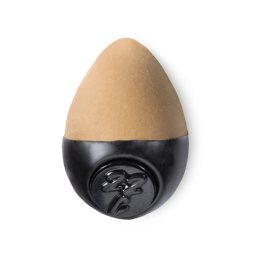 Slap Stick 22C. A medium dark-cool, rich tan coloured, egg-shaped solid foundation, with a black wax base.
