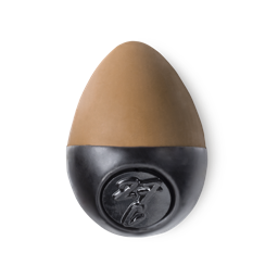 Slap Stick 27C. A medium dark-cool, light chocolate brown, egg-shaped solid foundation, with a black wax base.