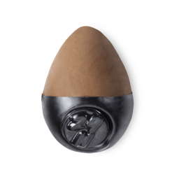 Slap Stick 29N. A medium dark-neutral, light chocolate brown, egg-shaped solid foundation, with a black wax base.