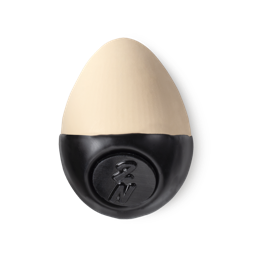 Slap Stick 2N. A light-neutral, cream-light beige coloured, egg-shaped solid foundation, with a black wax base.