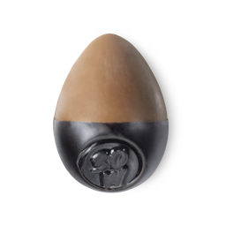 Slap Stick 30W. A medium dark-warm, light chocolate brown, egg-shaped solid foundation, with a black wax base.