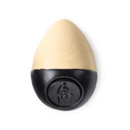 Slap Stick 6W. A light-warm, light beige, yellow-tinged coloured, egg-shaped solid foundation, with a black wax base.