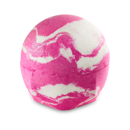 Snow Fairy bath bomb. The classic LUSH bath bomb is designed with pink and white swirls dusted with silver glitter.