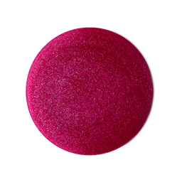 Snow Fairy. A perfectly circular swatch of thick, glossy, vivid-pink shampoo with silver shimmering glitter throughout. 