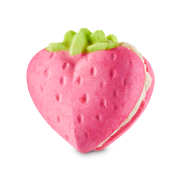 Strawberry Crumble Bubbleroon. A bubble bar styled like a macaron. It is strawberry-shaped and pink with a cocoa butter filling.