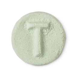 Tea Tree. A light green, powdery, circular solid toner tab, embossed with a T.