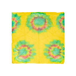A square Lokta Wrap with yellow, red and blue tie-dyed designs all over. 