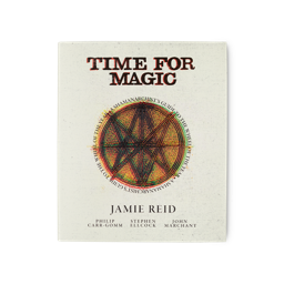 The image shows the cover for the book "Time For Magic" by Jamie Reid. The cover is a muted white with the title in large black letters. There is a large glitch-style circle and star in the centre.