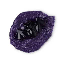 Toil and Trouble. A dollop of exfoliating, deep purple body scrub with a small, darker purple shower jelly bat on top.