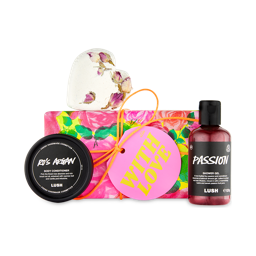 With Love gift. A colourful rose-patterned gift box containing a floral shower gel, bath bomb and body conditioner.