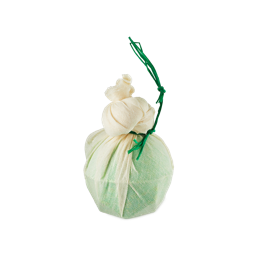 Woodstock. A vivid, forest-green bath bomb wrapped and knotted in biodegradable muslin cloth and green raffia paper to tie it. 